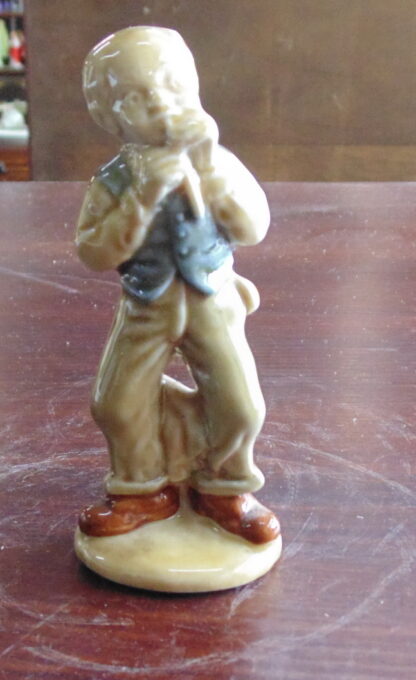 Ireland, Boy playing flute, Figure