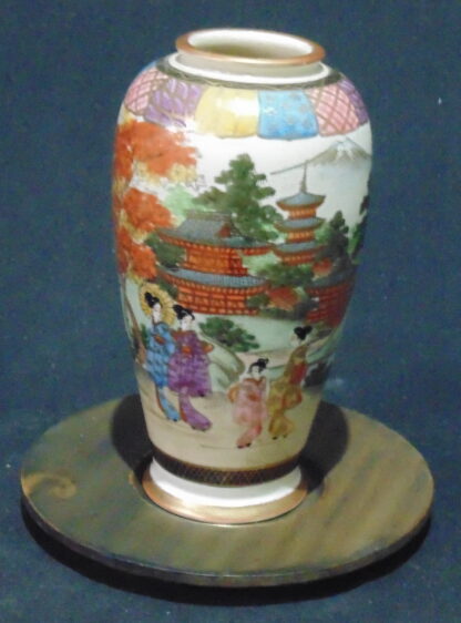 Oriental Vase on wooden stand