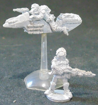 Metal figures, one on a speeder