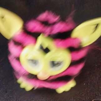 Hasbro Furby Boom interactive toy with a pink and black striped pattern